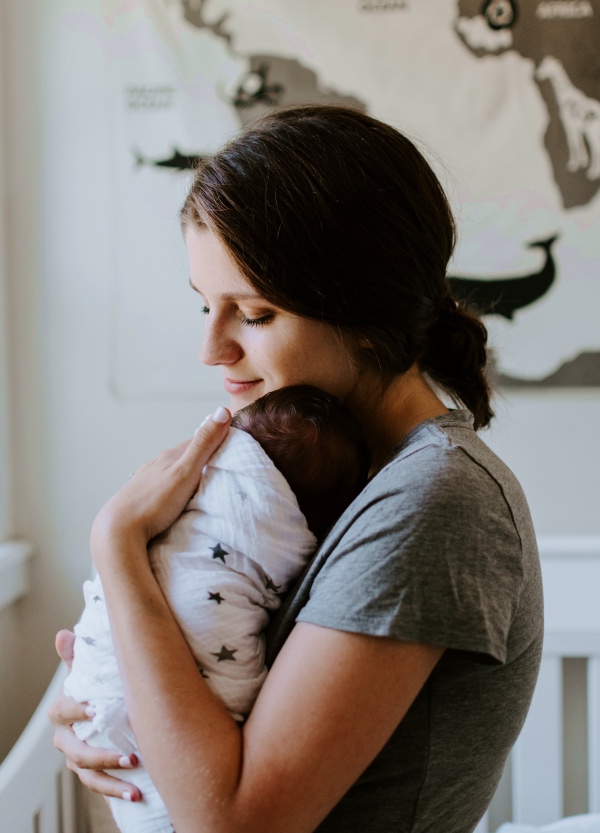 Mother bonding with her infant child; creating safety and security; creating deep bond with child; development secure attachment; stable loving relationship