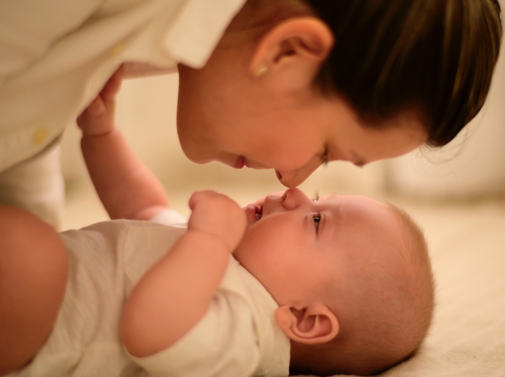 Mother bonding with her baby; create secure attachments with your baby; healthy attachments healthy relationships